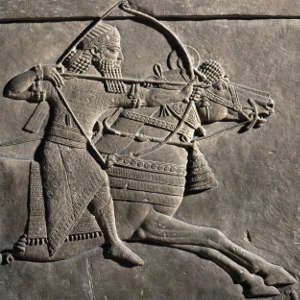 Ashurbanipal, last major ruler of the Assyrian Empire, depicted in the royal lion hunt bas-reliefs (c. 645 BCE) that were ripped from the walls of the North Palace at Nineveh during excavations in the mid 19th century and shipped to the British Museum. The bas-reliefs are widely regarded as 