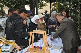 
During a recent event to watch a solar eclipse, booths were set up to explain science to excited young people.
