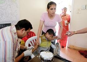 
A Zabbaleen boy, from a group traditionally employed to collect rubbish, is tested for hepatitis C in Cairo.
