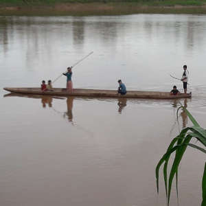 Tsimane family in a canoe.