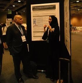 
Heba Al-Siddiqi explaining her work to Sir Magdi Yacoub.
