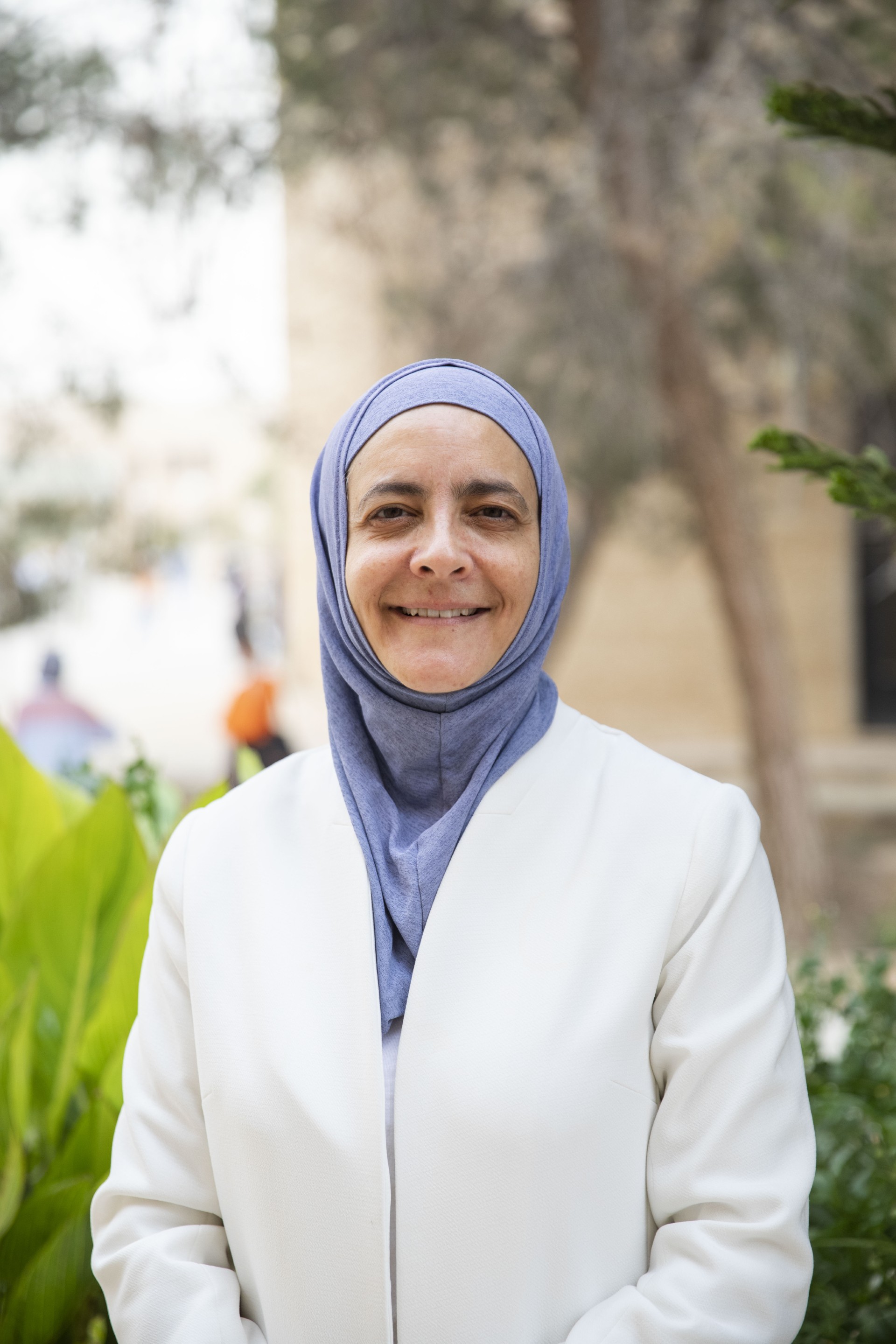 رنا الدجاني، أستاذة علم الجينات والبيولوجيا الجزيئية بالجامعة الهاشمية في الأردن.